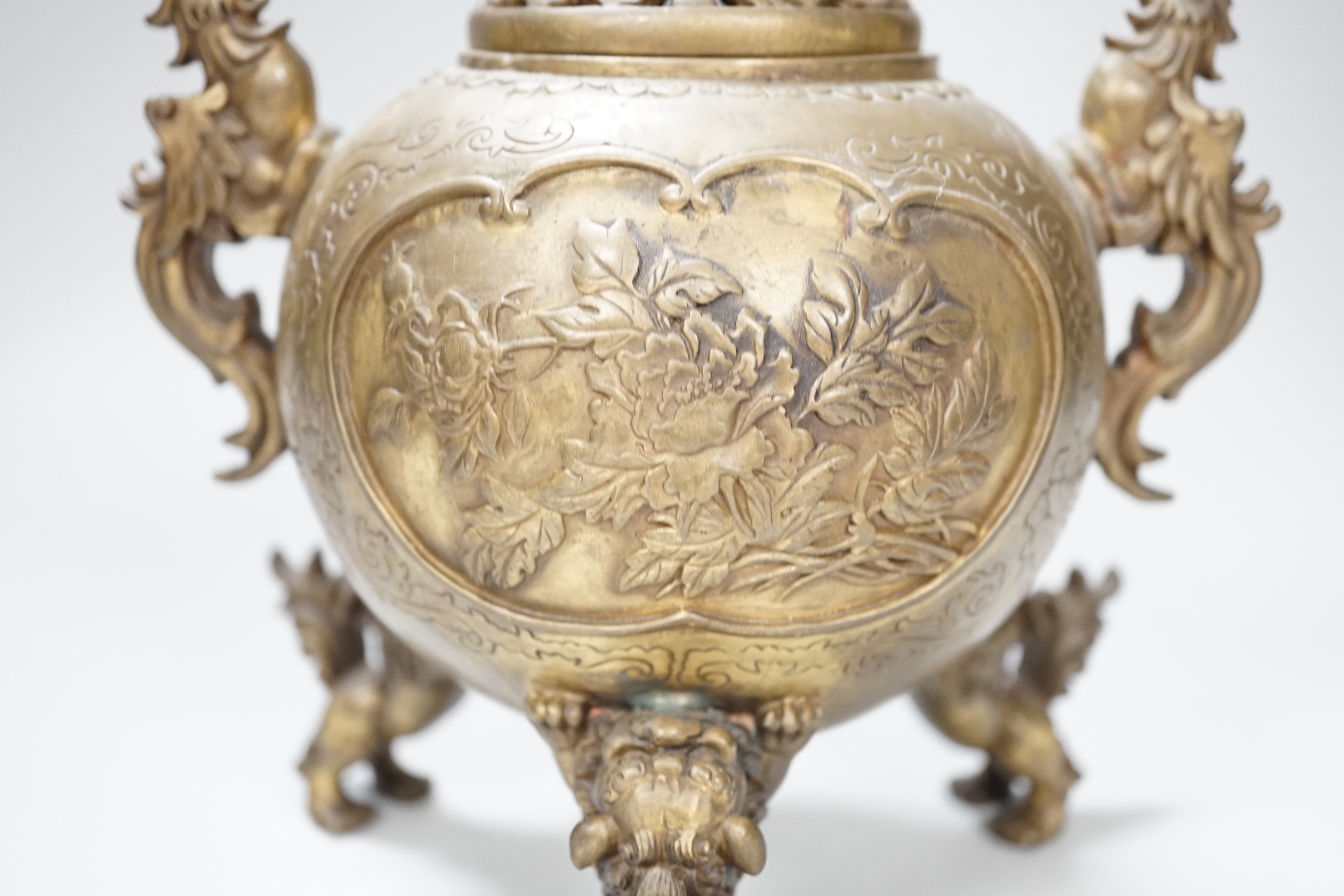 A Japanese bronze shi-shi footed censer and cover, 22cm high